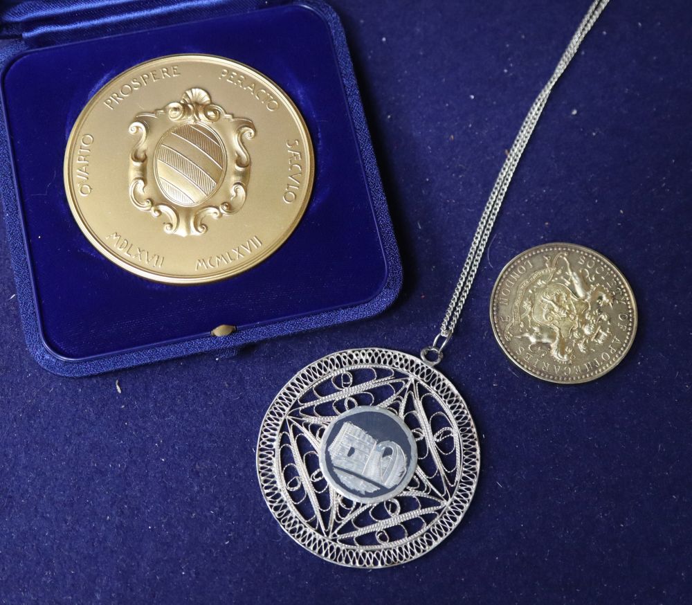 Three assorted medallions.